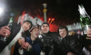 Young people drink champagne