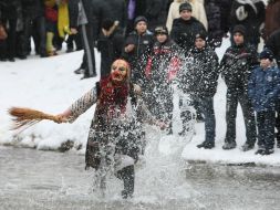 Participant of celebration in the suit of Baba-Yaga