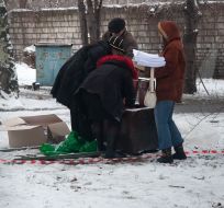Workers of electoral district near a safe