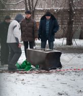 The employees of militia examine the unsealed safe