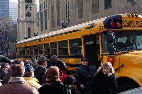 Electors come into the bus