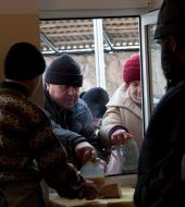 Beggars take with a food