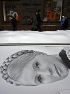 Dismantle propaganda billboard