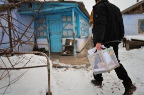 Election committee’s member carries a portable ballot-box