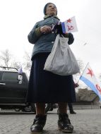 Woman stands with the flag of Russia