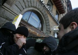 Young people stand near the bookstore of ”Syayvo”