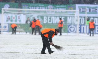 Cleaning up of stadium from snow