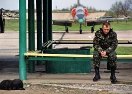 The pilots sit on the bench