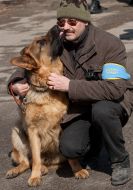 Cynologist-amateur with the dog