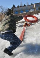 A rescuer demonstrates method the rescue of man