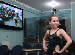 Girl demonstrates swimsuit