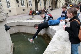 The guy was fill water in plastic bottle
