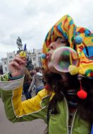 A girl inflates soap-bubbles