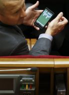 The deputy played on mobile phone