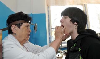 A doctor examines a conscript