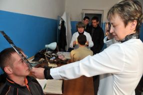 A doctor examines a conscript