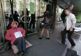 Depositor ”Nadra Bank” sits at the entrance