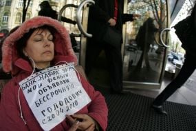 Depositor ”Nadra Bank” sits at the entrance