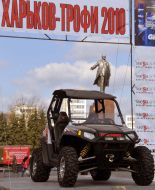 A racing car stands on a starting frame