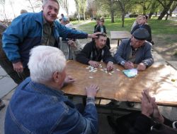 Participants of championship on the game of domino