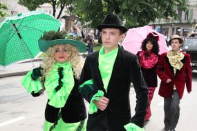 Festive parade participants