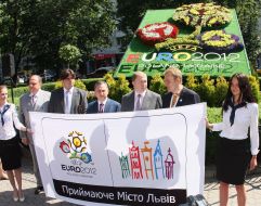 Opening of floral flowerbed in the form of Euro-2012 logotype