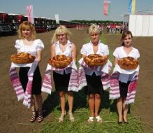 Girls holding bread and salt