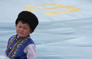 Boy in a national suit