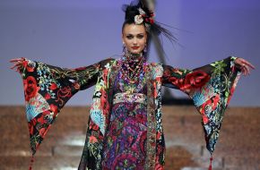 The model demonstrates outfit