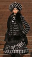 The model demonstrates outfit