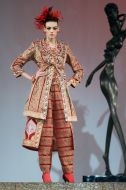 The model demonstrates outfit