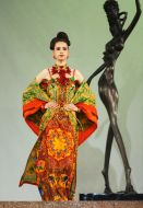 The model demonstrates outfit