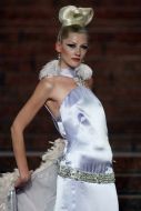 The model demonstrates outfit