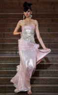 The model demonstrates outfit