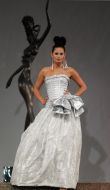 The model demonstrates outfit