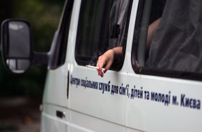 A homeless girl smokes