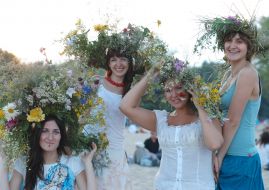 Girls are in chaplets from the fields flowers