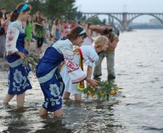 Girls put chaplets into water