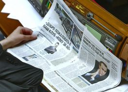 The deputy reads the newspaper