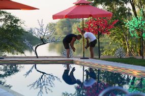 Workers decorate the residence