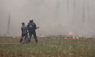 Firefighters extinguish a fire