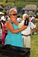 Participant of bilberry festival ”Verkhovinskaya yafina”