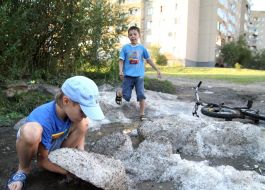 Children play with a hail