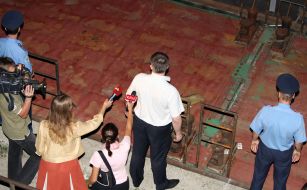 Employees of militia and journalists