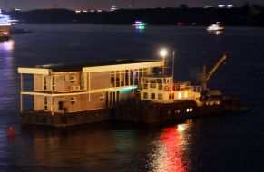 Tug with a floating office