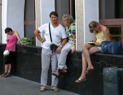 Passengers near building of the railway station