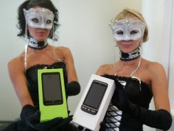 Models demonstrate mobile telephones