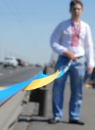 The participant of action opens out a ribbon