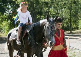 Cossack horseback riding girl