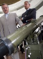 Anatoly Gritsenko inspects exhibits